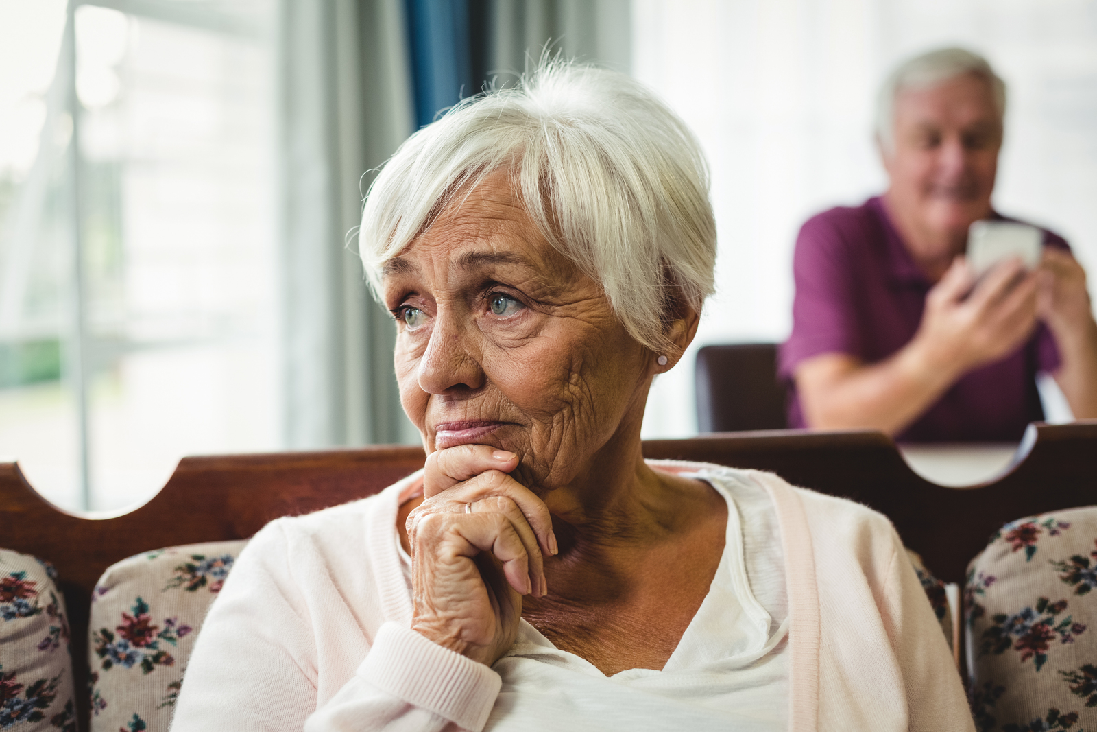 elderly woman looking worried