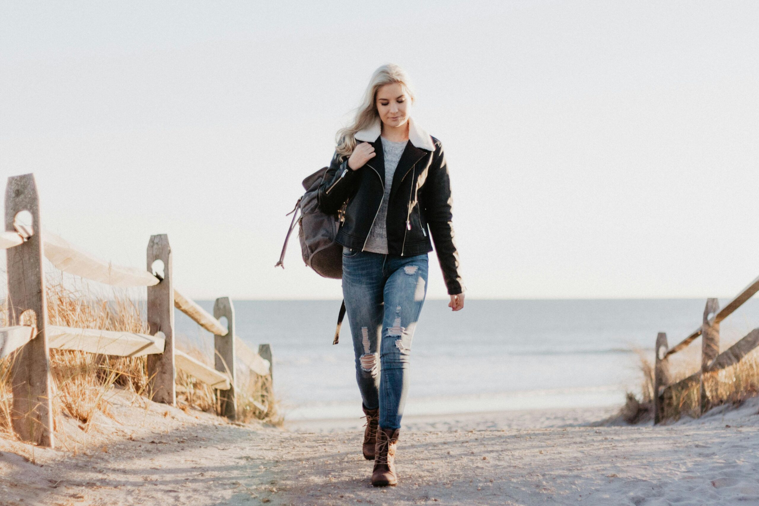 woman walking from beach